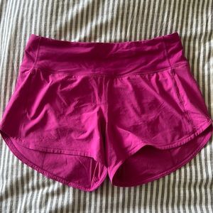 Pink Lululemon speed up shorts In a size 4 with a 4 inch inseam